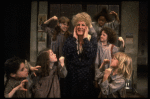 Ruth Kobart as Miss Hannigan w. orphans in a scene from a touring company of the musical "Annie." (Boston)