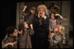 Ruth Kobart as Miss Hannigan w. orphans in a scene from a touring company of the musical "Annie." (Boston)