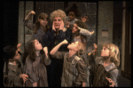 Ruth Kobart as Miss Hannigan w. orphans in a scene from a touring company of the musical "Annie." (Boston)