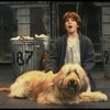 Louanne as Annie w. Sandy in a scene from a touring company of the musical "Annie." (Boston)