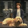 Louanne as Annie w. Sandy in a scene from a touring company of the musical "Annie." (Boston)