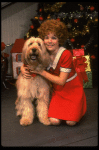 Louanne as Annie w. Sandy in a scene from a touring company of the musical "Annie." (Boston)