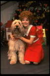 Louanne as Annie w. Sandy in a scene from a touring company of the musical "Annie." (Boston)