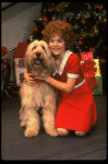 Louanne as Annie w. Sandy in a scene from a touring company of the musical "Annie." (Boston)