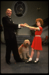 Norwood Smith as Daddy Warbucks and Louanne as Annie w. Sandy in a scene from a touring company of the musical "Annie." (Boston)
