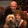 Norwood Smith as Daddy Warbucks and Louanne as Annie w. Sandy in a scene from a touring company of the musical "Annie." (Boston)