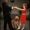 Norwood Smith as Daddy Warbucks and Louanne as Annie w. Sandy in a scene from a touring company of the musical "Annie." (Boston)