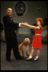 Norwood Smith as Daddy Warbucks and Louanne as Annie w. Sandy in a scene from a touring company of the musical "Annie." (Boston)