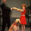 Norwood Smith as Daddy Warbucks and Louanne as Annie w. Sandy in a scene from a touring company of the musical "Annie." (Boston)