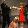 Norwood Smith as Daddy Warbucks and Louanne as Annie w. Sandy in a scene from a touring company of the musical "Annie." (Boston)