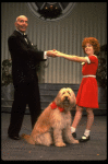 Norwood Smith as Daddy Warbucks and Louanne as Annie w. Sandy in a scene from a touring company of the musical "Annie." (Boston)