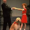 Norwood Smith as Daddy Warbucks and Louanne as Annie w. Sandy in a scene from a touring company of the musical "Annie." (Boston)