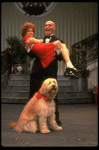Norwood Smith as Daddy Warbucks and Louanne as Annie w. Sandy in a scene from a touring company of the musical "Annie." (Boston)
