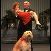 Norwood Smith as Daddy Warbucks and Louanne as Annie w. Sandy in a scene from a touring company of the musical "Annie." (Boston)