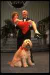 Norwood Smith as Daddy Warbucks and Louanne as Annie w. Sandy in a scene from a touring company of the musical "Annie." (Boston)