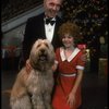 Norwood Smith as Daddy Warbucks and Louanne as Annie w. Sandy in a scene from a touring company of the musical "Annie." (Boston)