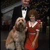 Norwood Smith as Daddy Warbucks and Louanne as Annie w. Sandy in a scene from a touring company of the musical "Annie." (Boston)