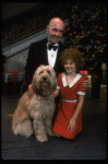 Norwood Smith as Daddy Warbucks and Louanne as Annie w. Sandy in a scene from a touring company of the musical "Annie." (Boston)
