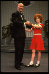 Norwood Smith as Daddy Warbucks and Louanne as Annie in a scene from a touring company of the musical "Annie." (Boston)