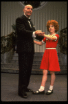 Norwood Smith as Daddy Warbucks and Louanne as Annie in a scene from a touring company of the musical "Annie." (Boston)