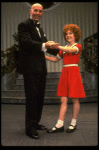 Norwood Smith as Daddy Warbucks and Louanne as Annie in a scene from a touring company of the musical "Annie." (Boston)