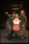 Martha Whitehead as Grace, Louanne as Annie and Norwood Smith as Daddy Warbucks in a scene from a touring company of the musical "Annie." (Boston)