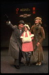 Martha Whitehead as Grace, Louanne as Annie and Norwood Smith as Daddy Warbucks in a scene from a touring company of the musical "Annie." (Boston)