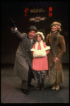 Martha Whitehead as Grace, Louanne as Annie and Norwood Smith as Daddy Warbucks in a scene from a touring company of the musical "Annie." (Boston)