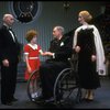 Martha Whitehead as Grace, Louanne as Annie, Norwood Smith as Daddy Warbucks and Randall Robbins as FDR from a touring company of the musical "Annie." (Boston)