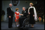 Martha Whitehead as Grace, Louanne as Annie, Norwood Smith as Daddy Warbucks and Randall Robbins as FDR from a touring company of the musical "Annie." (Boston)
