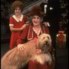 Ruth Kobart as Miss Hannigan, Louanne as Annie, and Norwood Smith as Daddy Warbucks w. Sandy in a scene from a touring company of the musical "Annie." (Boston)