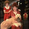 Ruth Kobart as Miss Hannigan, Louanne as Annie, and Norwood Smith as Daddy Warbucks w. Sandy in a scene from a touring company of the musical "Annie." (Boston)