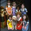 Louanne as Annie w. orphans and Sandy in a scene from a touring company of the musical "Annie." (Boston)