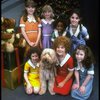 Louanne as Annie w. orphans and Sandy in a scene from a touring company of the musical "Annie." (Boston)