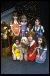 Louanne as Annie w. orphans and Sandy in a scene from a touring company of the musical "Annie." (Boston)