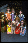 Louanne as Annie w. orphans and Sandy in a scene from a touring company of the musical "Annie." (Boston)