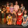 Louanne as Annie w. orphans and Sandy in a scene from a touring company of the musical "Annie." (Boston)
