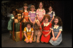 Louanne as Annie w. orphans and Sandy in a scene from a touring company of the musical "Annie." (Boston)