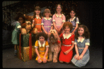 Louanne as Annie w. orphans and Sandy in a scene from a touring company of the musical "Annie." (Boston)