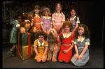 Louanne as Annie w. orphans and Sandy in a scene from a touring company of the musical "Annie." (Boston)