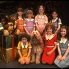 Louanne as Annie w. orphans and Sandy in a scene from a touring company of the musical "Annie." (Boston)