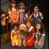 Louanne as Annie w. orphans and Sandy in a scene from a touring company of the musical "Annie." (Boston)