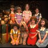 Louanne as Annie w. orphans and Sandy in a scene from a touring company of the musical "Annie." (Boston)