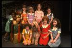 Louanne as Annie w. orphans and Sandy in a scene from a touring company of the musical "Annie." (Boston)