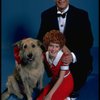 Allison Smith as Annie and Harve Presnell as Daddy Warbucks w. Sandy in a scene from the Broadway production of the musical "Annie." (New York)