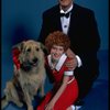 Allison Smith as Annie and Harve Presnell as Daddy Warbucks w. Sandy in a scene from the Broadway production of the musical "Annie." (New York)