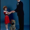 Allison Smith as Annie and Harve Presnell as Daddy Warbucks w. Sandy in a scene from the Broadway production of the musical "Annie." (New York)