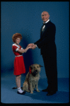 Allison Smith as Annie and Harve Presnell as Daddy Warbucks w. Sandy in a scene from the Broadway production of the musical "Annie." (New York)
