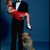 Allison Smith as Annie and Harve Presnell as Daddy Warbucks w. Sandy in a scene from the Broadway production of the musical "Annie." (New York)