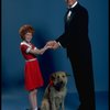 Allison Smith as Annie and Harve Presnell as Daddy Warbucks w. Sandy in a scene from the Broadway production of the musical "Annie." (New York)